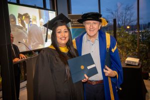 Chancellor with graduate 5