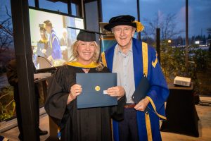 Chancellor with graduate 8