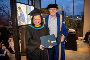 Chancellor with graduate 9