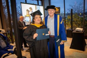 Chancellor with graduate